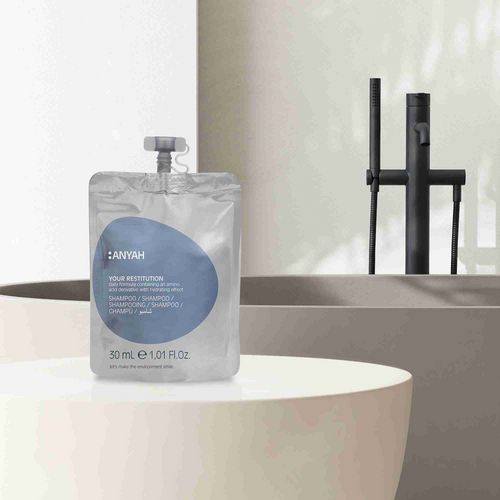 Compact Anyah shampoo doypack enriched with amino acid for soft manageable hair