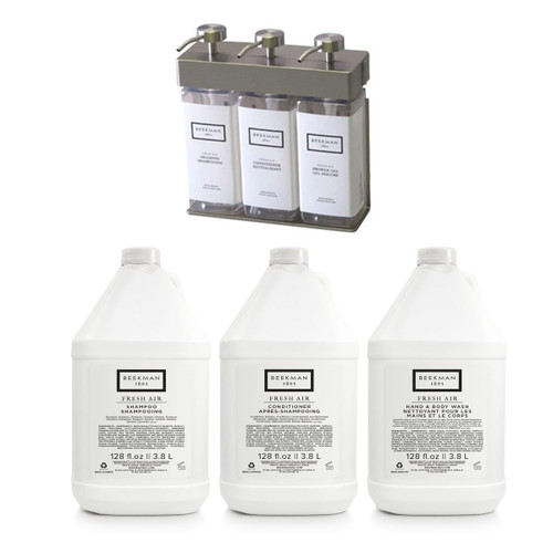Three Beekman 1802 Fresh Air 1 gal jugs beside satin-finish SOLera wall dispenser
