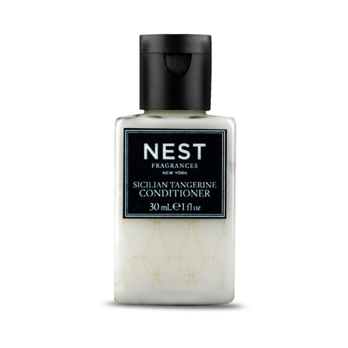 Nest conditioner 1 oz bottles in recyclable travel-size packaging