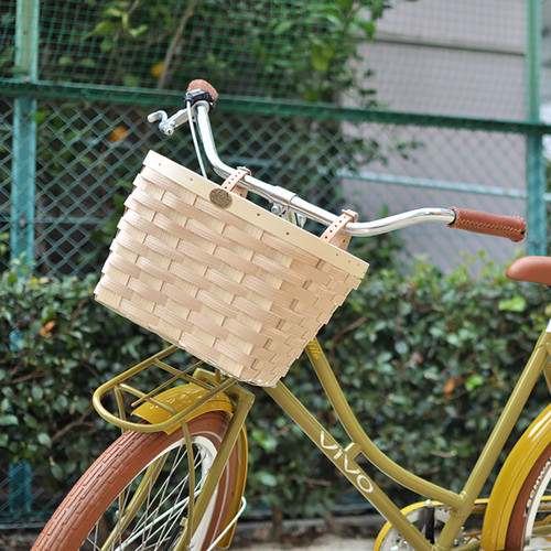 Yellow bike shop with basket