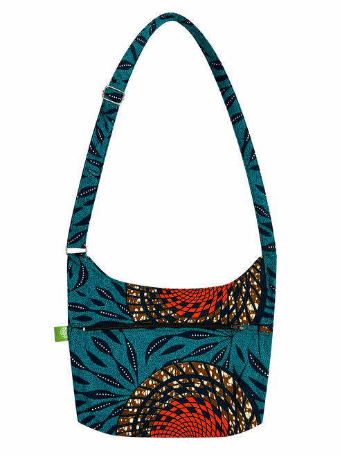 Our NEW travel purse is compact but has space for all the essentials, inside and outside pockets, and a long adjustable strap.