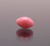 Natural pink Conch pearl, 7.18 × 5.14mm, oval button shape with visible flame structure- side 1