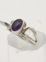 <p>Amethyst cabochon ring in 925 sterling silver. Size 6.0</p>