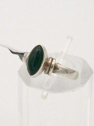 <p>Green onyx cabochon ring in 925 sterling silver. Size 7.0</p>