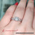 emerald cut lab diamond infinity engagement ring in FD9986R1 EM NL WG