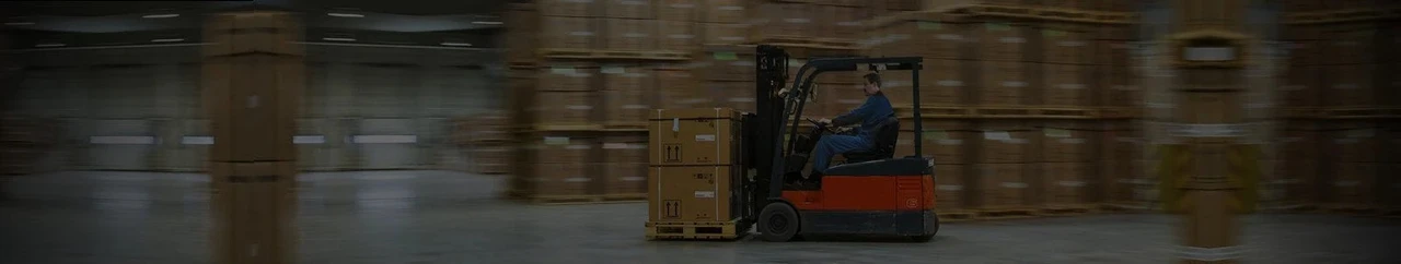 Electric Lift Truck in Warehouse