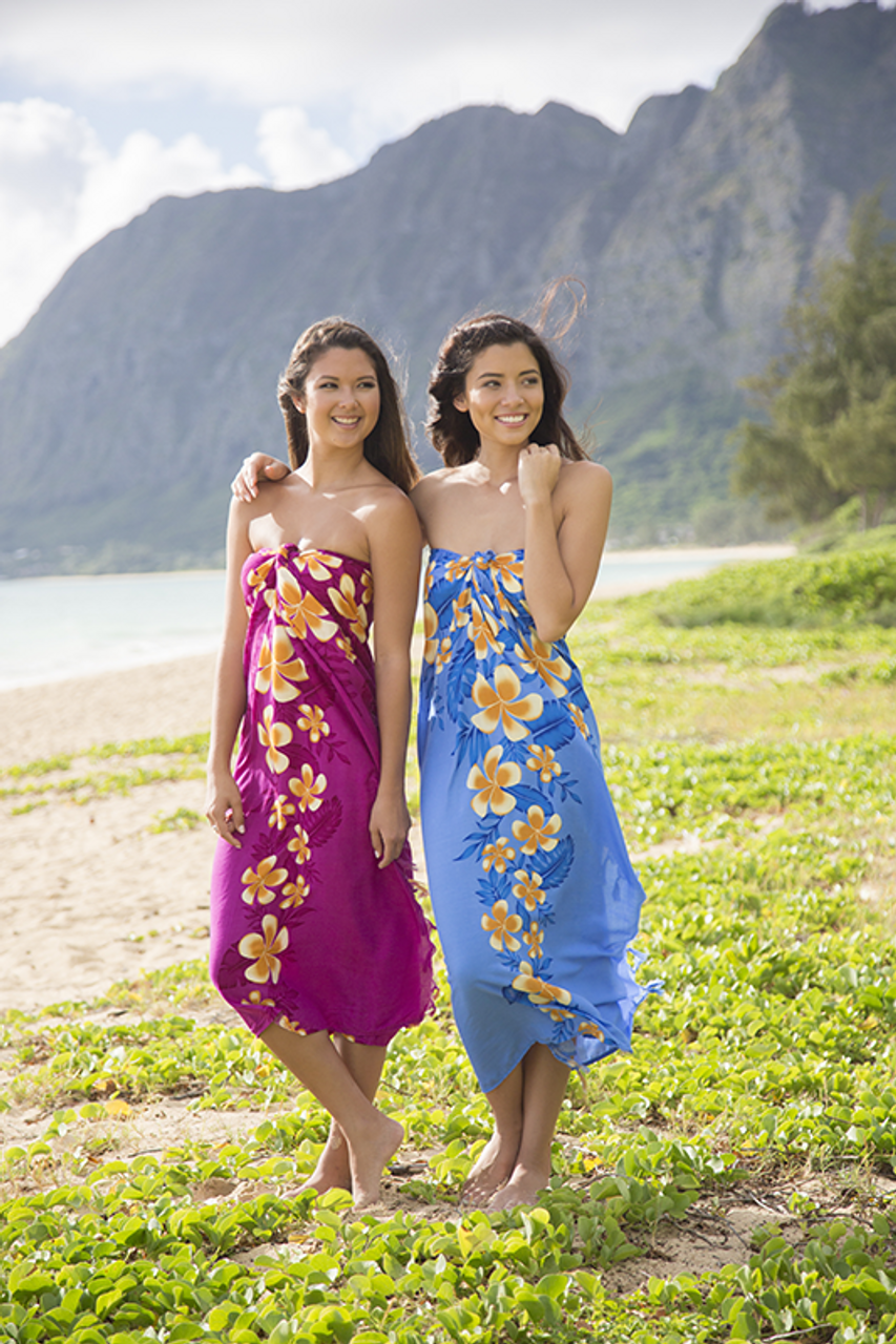 Elegant Polynesian Model in Metallic Tropical Gown on Beach