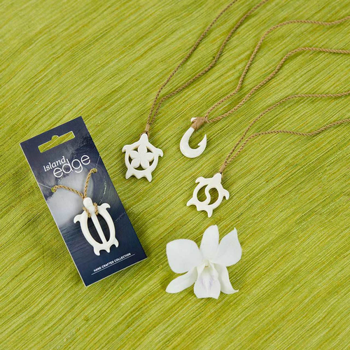 Island Edge Hand Crafted Bone Necklace designs displayed in order from left to right: Strong Honu, Plumeria Honu, Fish Hook, and Yin Yang Honu