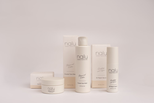 Nalu Hawaii Skincare - Specialty 3 Piece Bundle standing upright with packaging in behind.