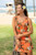 Female model wearing Rayon Aloha Dress Dresses have a string-tie in front