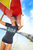 Female model wearing Island Girl® Surf Tee - Garden in Charcoal Heather color