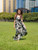 Model wearing Napua Collection Ruffle Maxi Dress - Abstract Monstera: Black Pattern (Front)