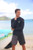 Hawaii Loa Rashguard Longsleeve - UPF 50: Black With Green Honu featured on male model