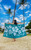 Model featured with Sunny Hawaii Blanket Towel: Hibiscus - Teal