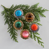 Victorian Jewel knobs shown in Turquoise, Green Malachite, Tiger Eye, Pink Cat's Eye, and Coral stones