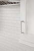 Amerock, Monument, 3 3/4" (96mm) Straight Pull, Polished Chrome - installed 1