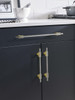 Amerock, Urbanite, 5 1/16" (128mm) Bar Pull, Brushed Gold with Black Chrome - installed 1