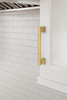 Amerock, Everyday Basics, Triomphe, 5 1/16" (128mm) Straight Pull, Champagne Bronze - installed