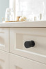 Amerock, Ballard, 1" Round Knob, Matte Black - installed 1 Amerock, Ballard, 1" Round Knob, Matte Black - installed 1
