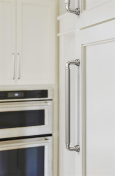 Amerock, Cowrie, 8 13/16" (224mm) Straight Pull, Polished Nickel - installed 1