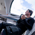 Offshore sailor wearing Musto HPX Merino thermal base layer trousers in harsh conditions