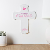 Custom pink girl first communion wall cross hanging over table