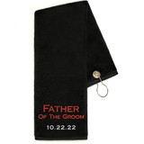 Custom Golf Towel in black embroidered with Father of the Groom in red thread and the wedding date in white thread.