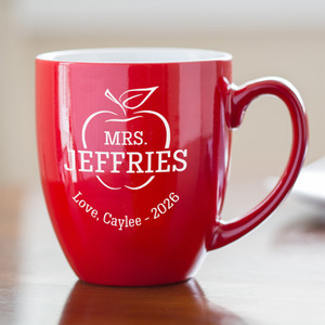Personalized Teacher Appreciation coffee mug with a handle to the right, personalized with your teacher's name in the apple outline and your special message shown on the table in the morning with breakfast. Personalized Teacher Appreciation coffee mug with a handle to the right, personalized with your teacher's name in the apple outline and your special message shown on the table in the morning with breakfast.