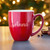 Engraved Red Coffee Mug with Name alternate angle showing engraving and finish