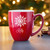 Christmas Coffee Mug (Snowflake) displayed in holiday setting