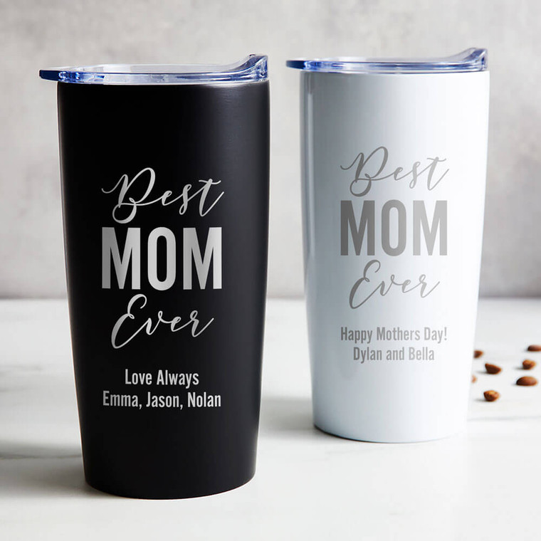 Personalized Best Mom Ever stainless steel coffee tumbler in black or white laser engraved with your term of endearment and a special message, displayed on table.