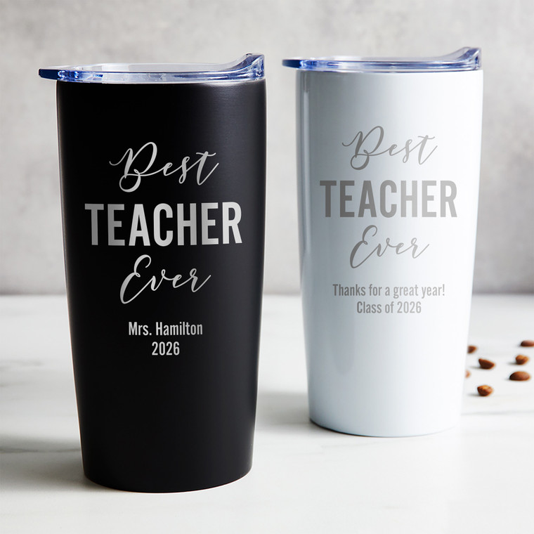 Personalized Best Teacher Ever stainless steel coffee tumbler in black or white laser engraved with your Best Teacher Ever and your special message, displayed on table.