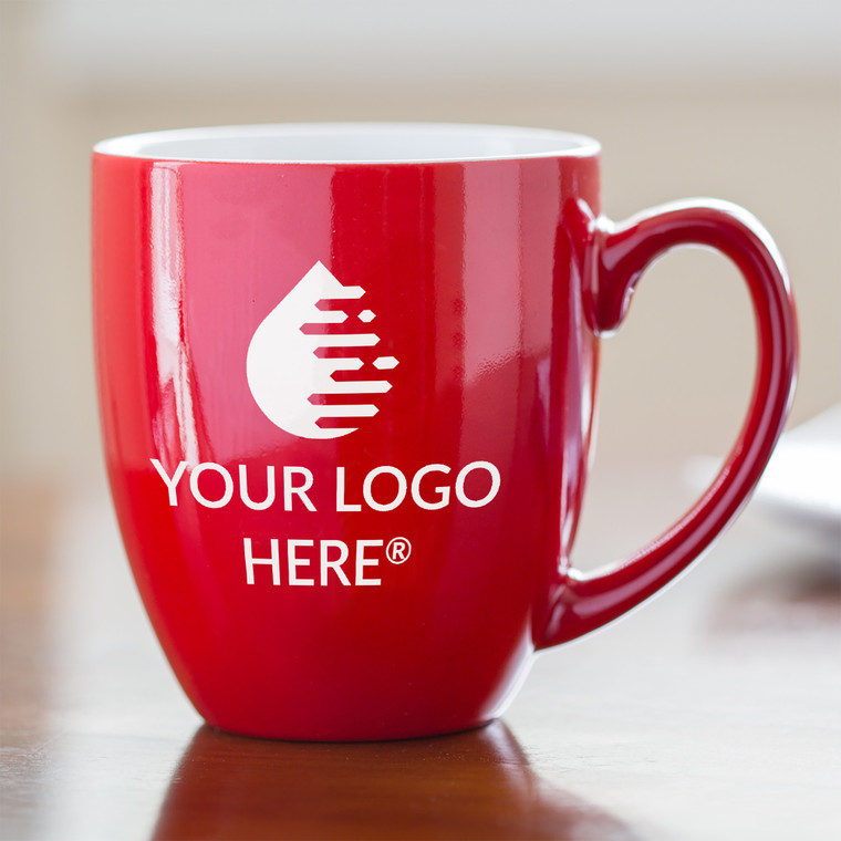 Bulk Custom Engraved with Your Logo coffee mug with handle to the right personalized with your company's logo or your custom artwork shown on table in the morning with breakfast.