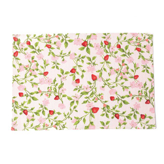 Rectangular botanical berry placemat with green vines and strawberry bud print on pink background (top view)