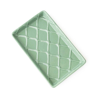 Green ceramic soap dish with textured pattern for bathroom countertop or sink (angled view)