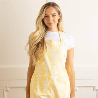 8 Oak Lane golden damask apron in soft yellow with elegant damask pattern (lifestyle view)
