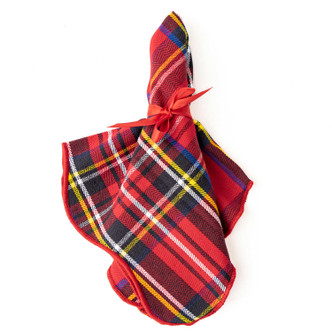 Red tartan plaid cotton dinner napkin tied with a red ribbon