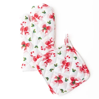 Holly Jolly Bows oven mitt and potholder set with red bows and candy canes on white