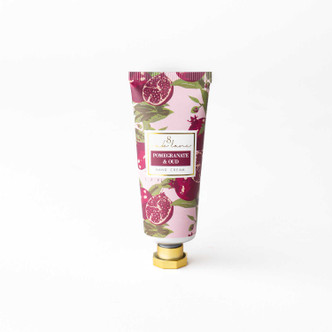 Pomegranate & Oud travel hand cream tube in a pink pomegranate print