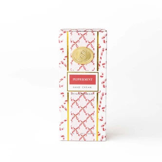 Peppermint Candy Cane hand cream box and tube in a red and gold lattice print (alternate angle)
