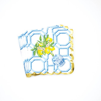 Blue lattice paper beverage napkin with lemon branches and a gold foil scalloped edge