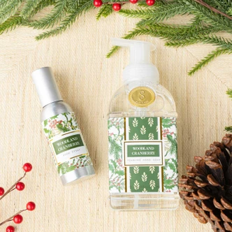 Woodland Cranberry room and linen spray bottle in a green pine and holly print (alternate angle)
