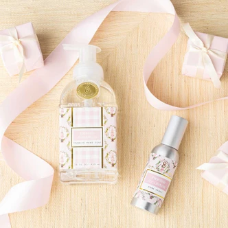 Frosted Sugarplum foaming hand soap pump bottle in a pink gingham nutcracker print (alternate angle)
