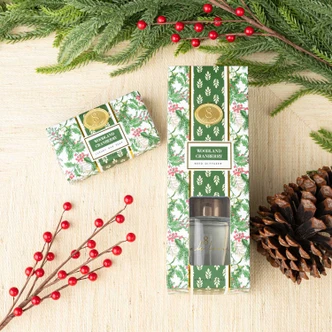 Wrapped bar soap in a Woodland Cranberry holly and greenery print (alternate angle)