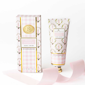 Frosted Sugarplum hand cream box and tube in a pink gingham nutcracker print