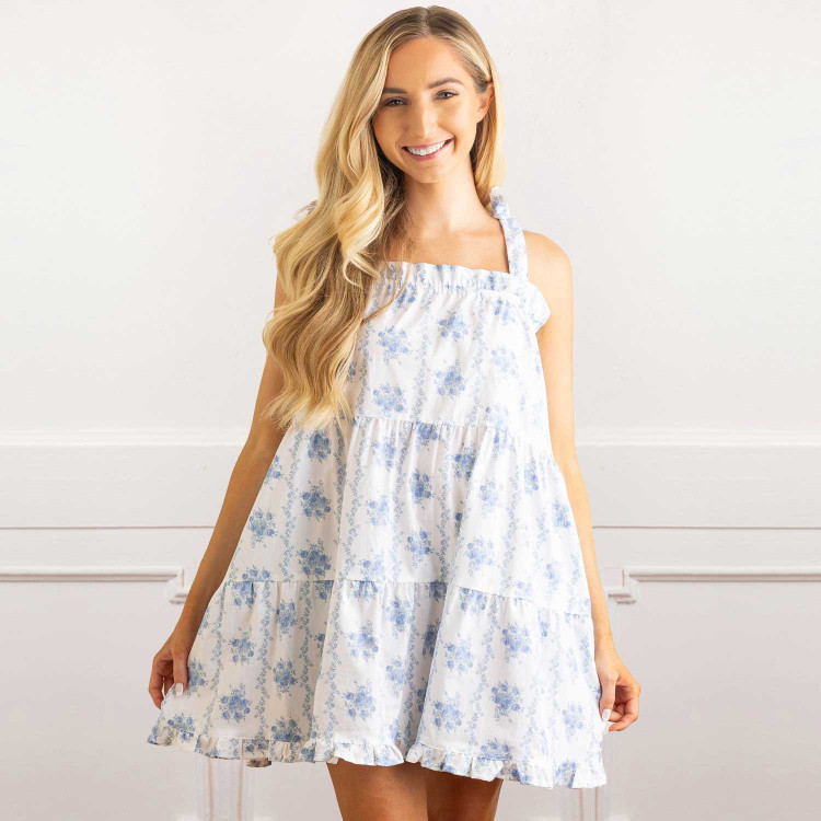 8 Oak Lane women’s white cotton sleep dress with blue rose vine floral print, adjustable tie straps and ruffle hem (front view)