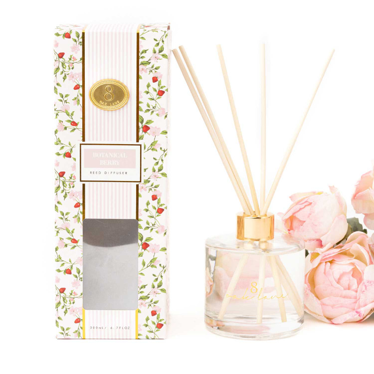 8 Oak Lane botanical berry reed diffuser with glass bottle, natural reeds and pink floral packaging (front view)