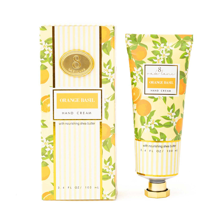 Orange Basil hand cream box and tube in an orange and blossom print
