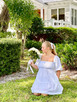 Detail of 8 Oak Gifts White Eyelet Puff Sleeve Smocked Dress