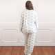 Back view of women’s blue rose vine pajama set with relaxed fit pants
